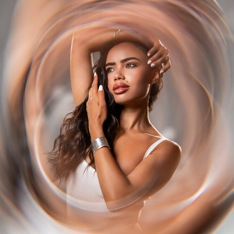 Beauty portrait of a woman surrounded by a circular Black Hole optical swirl
